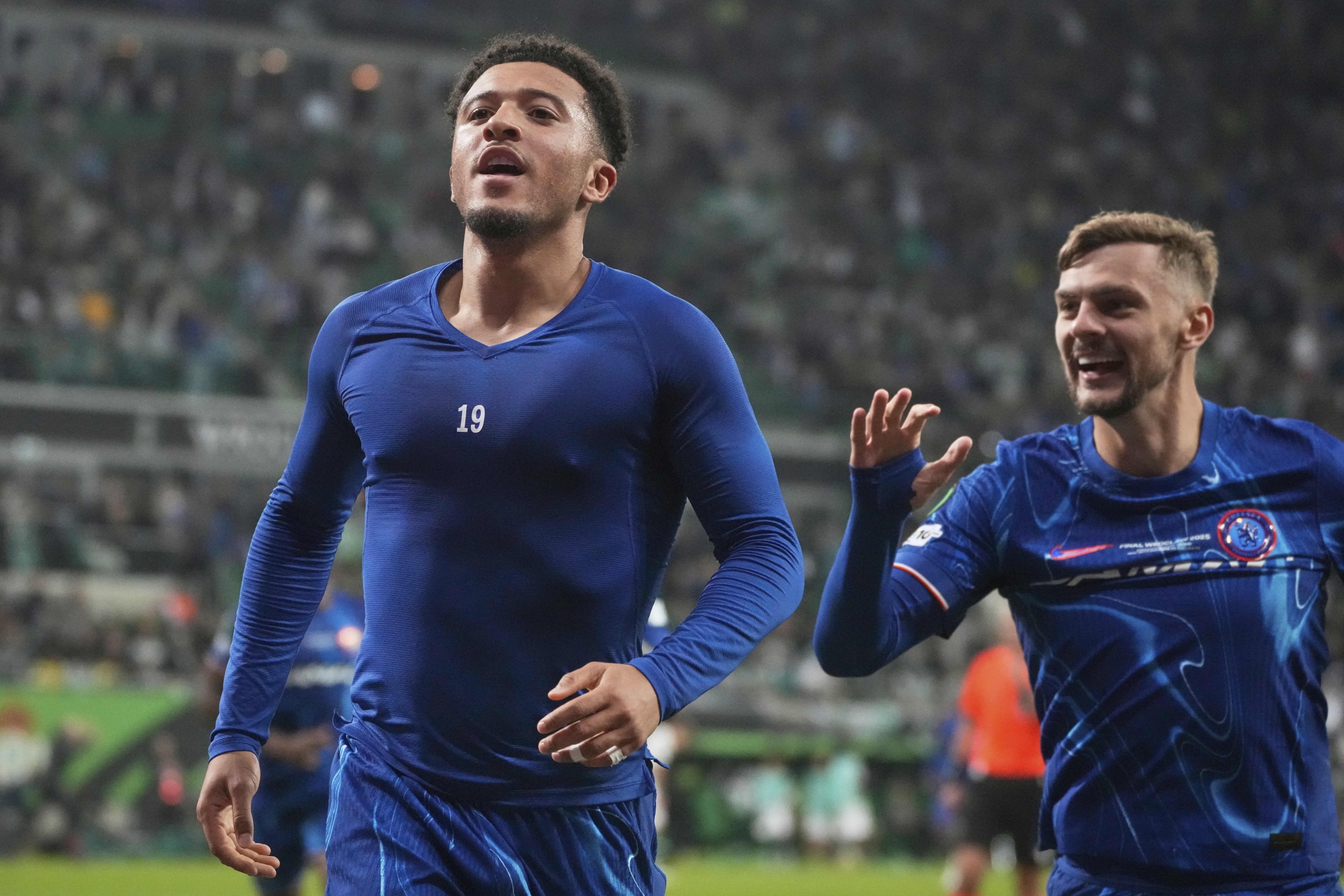 Chelsea's Jadon Sancho (L) celebrates after scoring his side's third goal during the Europa Conference League final match between Real Betis and Chelsea, Wroclaw, Poland, May 28, 2025. (AP Photo)