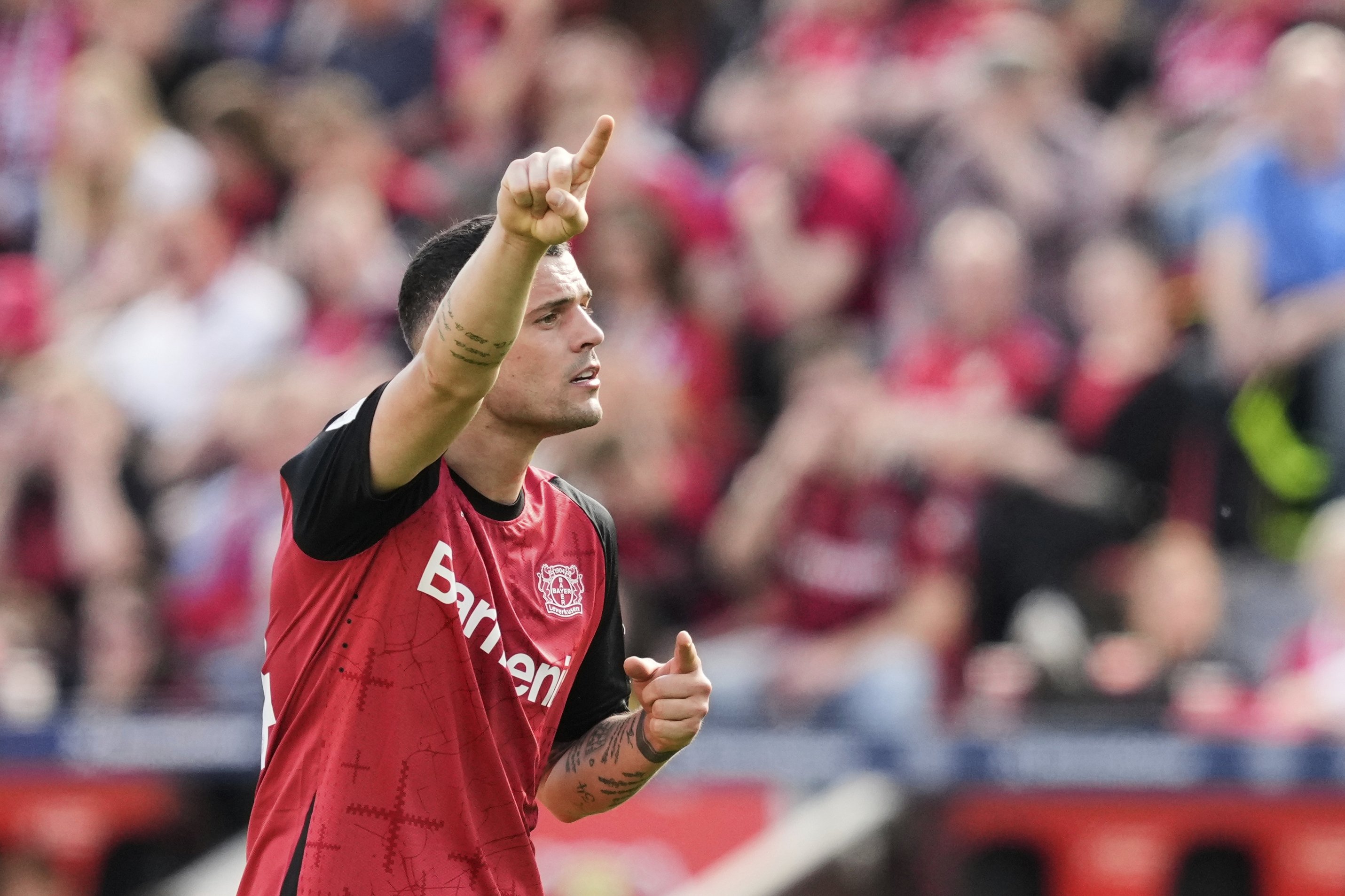 Leverkusen's Granit Xhaka gestures during the German Bundesliga match between Bayer Leverkusen and FC Augsburg at the BayArena, Leverkusen, Germany, April 26, 2025. (AP Photo)