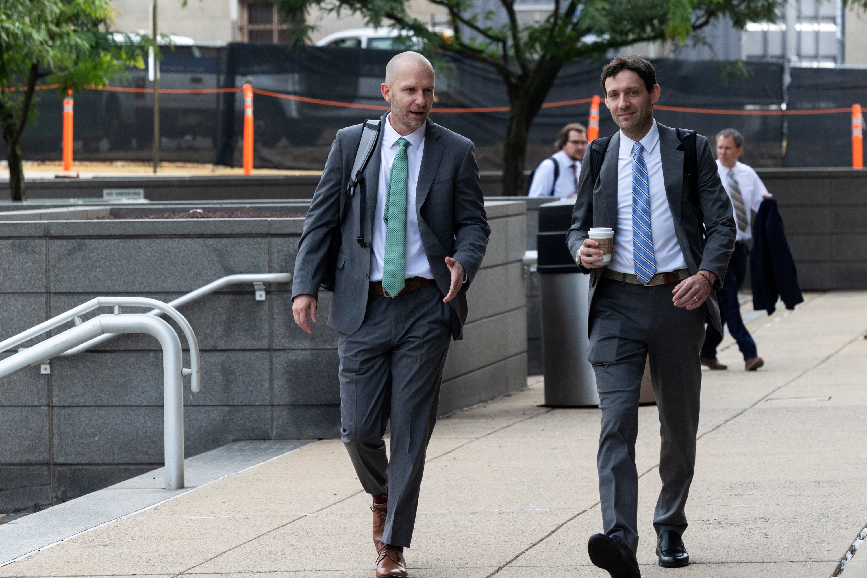 Max Huffman (R), plaintiff attorney, walks into the Leonard L. Williams Justice Center where Mark Zuckerberg and other top officials from Meta Platforms will take the stand to defend against allegations by investors that they should be held liable for billions of dollars in fines for privacy violations by Facebook, in Wilmington, Delaware, U.S. July 17, 2025. (Reuters Photo)