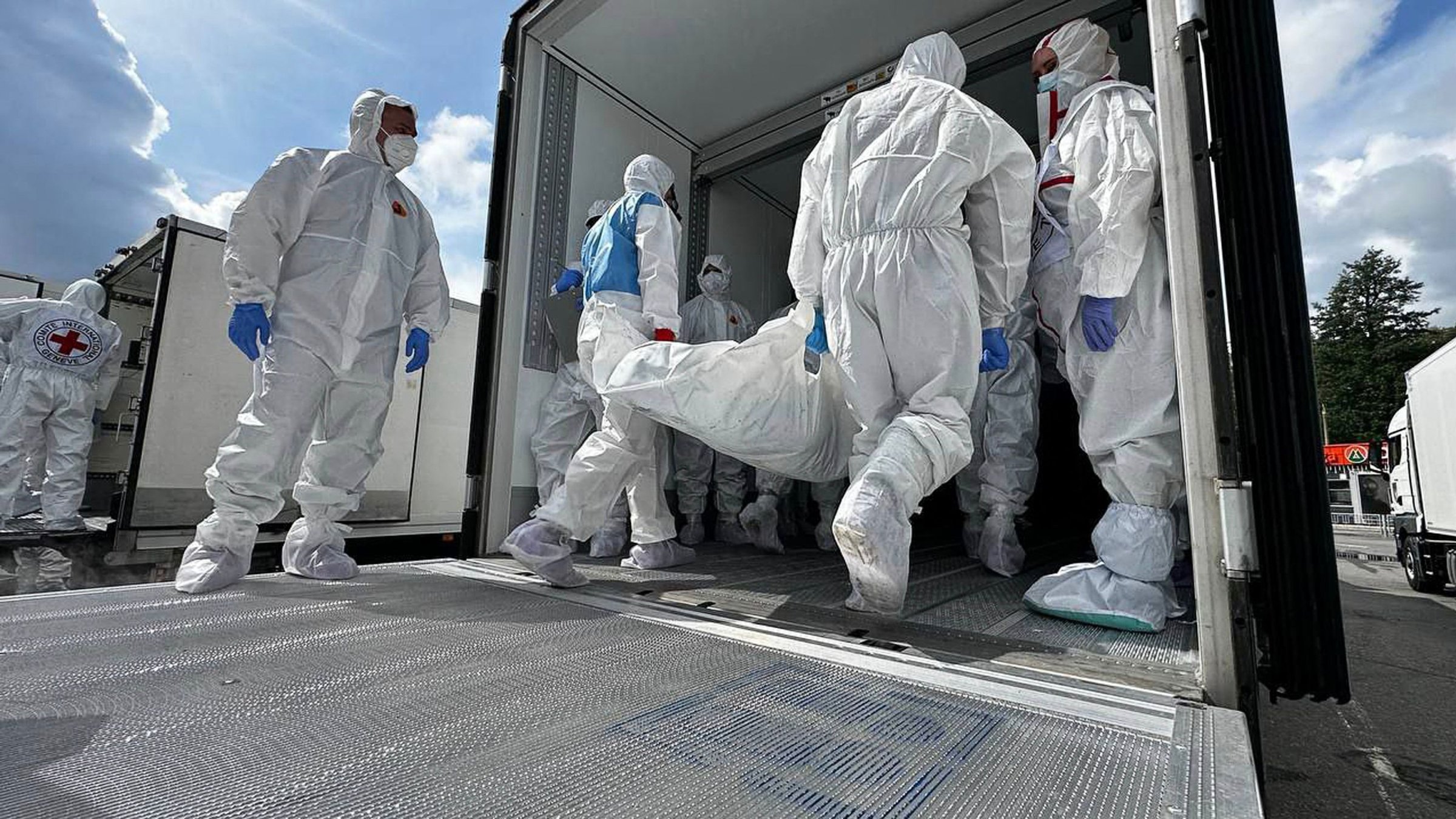 A body exchange procedure takes place in an undisclosed location at Belarus-Ukraine border, July 17, 2025. (AFP Photo)