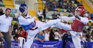 Taekwondo stars in action during the Anatolian Stars League (ANALİG) Taekwondo 1st Stage 1st Group Competitions, Balıkesir, Türkiye, June 22, 2025. (IHA Photo)