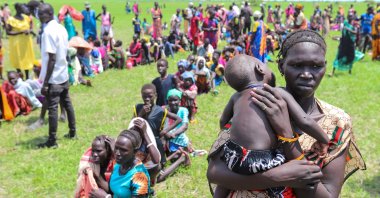 South Sudanese asylum-seekers line up to receive fortified biscuits as part of World Food Programme (WFP) food assistance, the Matar refugee camp, in the Gambella region, Ethiopia, June 13, 2025. (Reuters Photo)