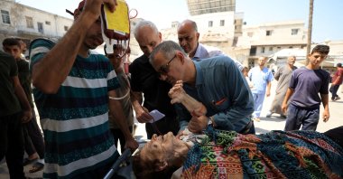 A wounded Palestinian Christian woman is brought into at al-Ahli Arab Hospital following an Israeli strike on The Church of the Holy Family, in Gaza City, central Gaza, July 17, 2025. (Reuters Photo)