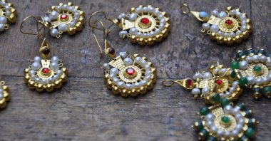 Pearl earrings are on display at craftsman Erkan Gürol’s workshop in Sivrihisar, Eskişehir, Türkiye, July 15, 2025. (AA Photo)