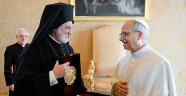 Pope Leo interacts with Greek Orthodox Archbishop Elpidophoros of America, as he attends a meeting with participants of the Orthodox-Catholic Ecumenical Pilgrimage from the U.S., Vatican City, July 17, 2025. (Reuters Photo)