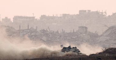 An Israeli tank maneuvers in Gaza, as seen from the Israeli side of the border, June 17, 2025. (Reuters Photo)