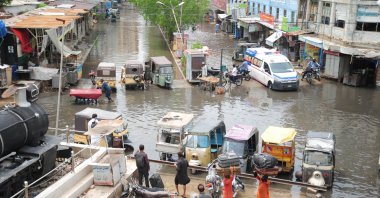 Vehicles drive through floodwater in Hyderabad, Pakistan, July 15, 2025. (EPA Photo)