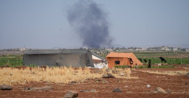 Smoke rises from fires in areas controlled by Druze factions in the Suwayda countryside, Syria, July 17, 2025. (EPA Photo)