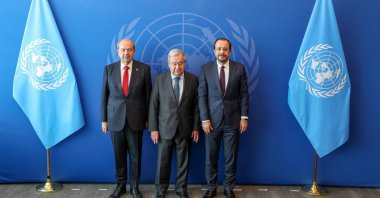 Ersin Tatar, the president of the Turkish Republic of Northern Cyprus (TRNC), U.N. Secretary-General Antonio Guterres, and Greek Cypriot leader Nikos Christodoulides pose for a photo in New York, U.S., July 17, 2025. (AA Photo)