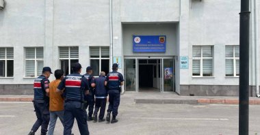 Gendarmerie forces escort Daesh suspects, Kayseri province, Türkiye, July 16, 2025. (IHA Photo)