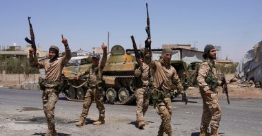 Syrian security forces walk together along a street, after clashes between Syrian government troops and local Druze fighters, Suwayda, Syria, July 16, 2025. (Reuters Photo)