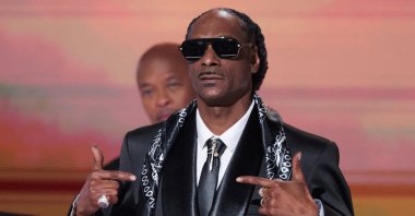 Snoop Dogg gestures on stage at the 25th annual BET (Black Entertainment Television) Awards, Los Angeles, U.S., June 9, 2025. (Reuters Photo)