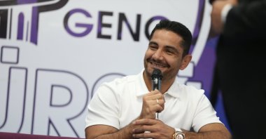 Turkish Wrestling Federation President Taha Akgül speaks during a discussion held at the Kars Şehit Şentürk Aydıner Youth Center, Kars, Türkiye, July 17, 2025. (AA Photo)