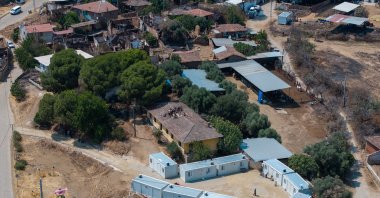 An aerial view of temporary container shelters set up to house wildfire victims in multiple neighborhoods of Izmir, Türkiye, July 17, 2025. (AA Photo)