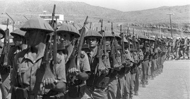 Turkish soldiers walk in a column at an undisclosed location on the island of Cyprus months after the Cyprus Peace Operation, Sept. 18, 1974. (AFP Photo)