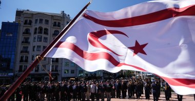 The TRNC flag flies as veterans of the Cyprus Peace Operation join dignitaries for a ceremony, Istanbul, Türkiye, July 20, 2025. (AA Photo)