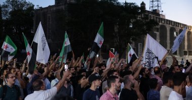 Syrians demonstrate to denounce the Israeli airstrikes, Damascus, Syria, July 16, 2025. (EPA Photo)
