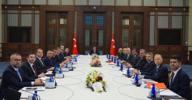 Vice President Cevdet Yılmaz (C) and other officials pose for a photo before the Economic Coordination Board (EKK) meeting, Ankara, Türkiye, July 21, 2025. (AA Photo)