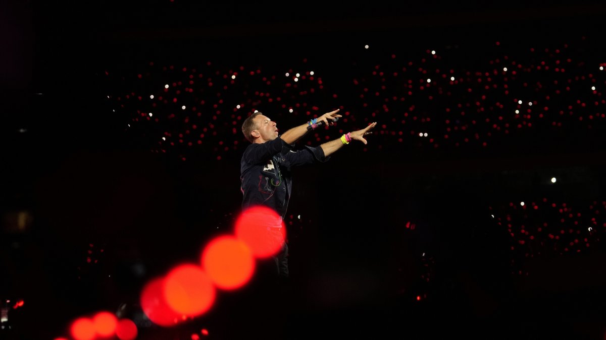 Chris Martin of Coldplay performs during the band&#039;s Music Of The Spheres World Tour, Navi Mumbai, India, Jan. 18, 2025. (AP Photo)