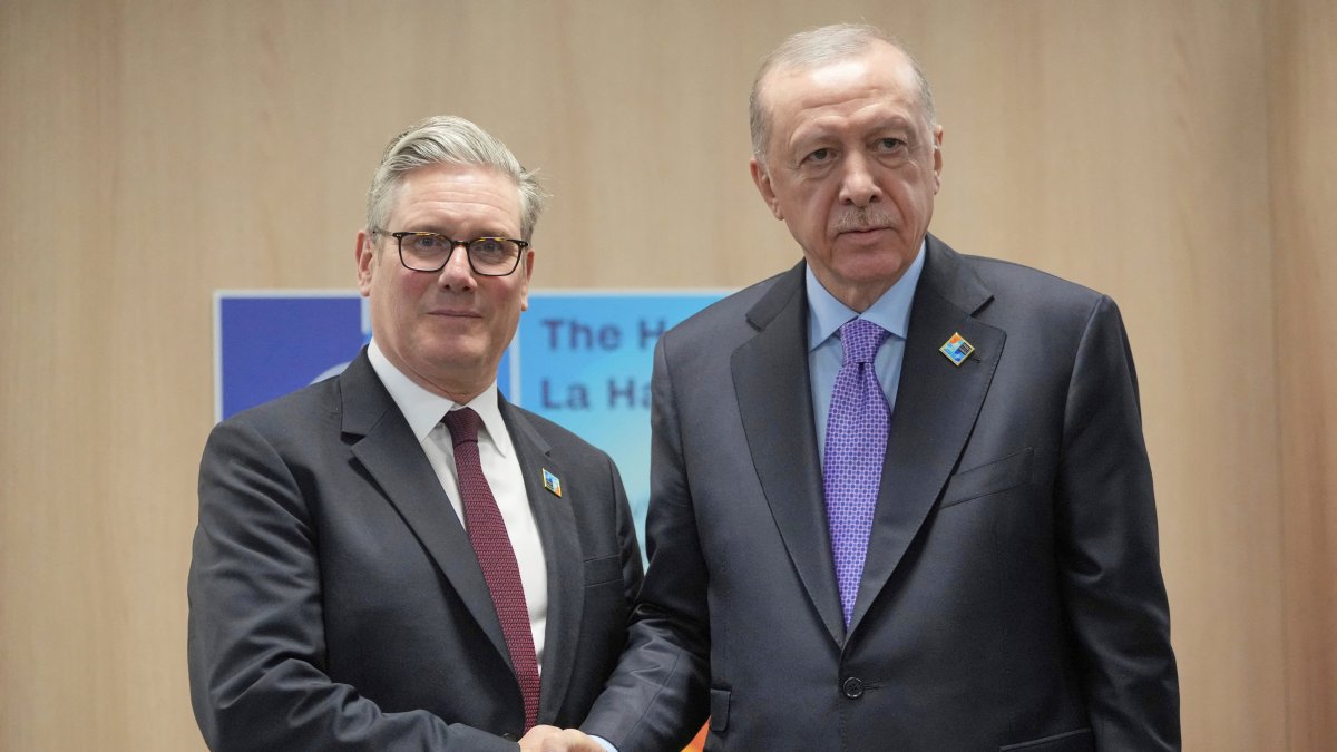 President Recep Tayyip Erdoğan (R) and Britain&#039;s Prime Minister Keir Starmer shake hands during a bilateral meeting at the NATO summit in The Hague, Netherlands, June 25, 2025. (Reuters Photo)