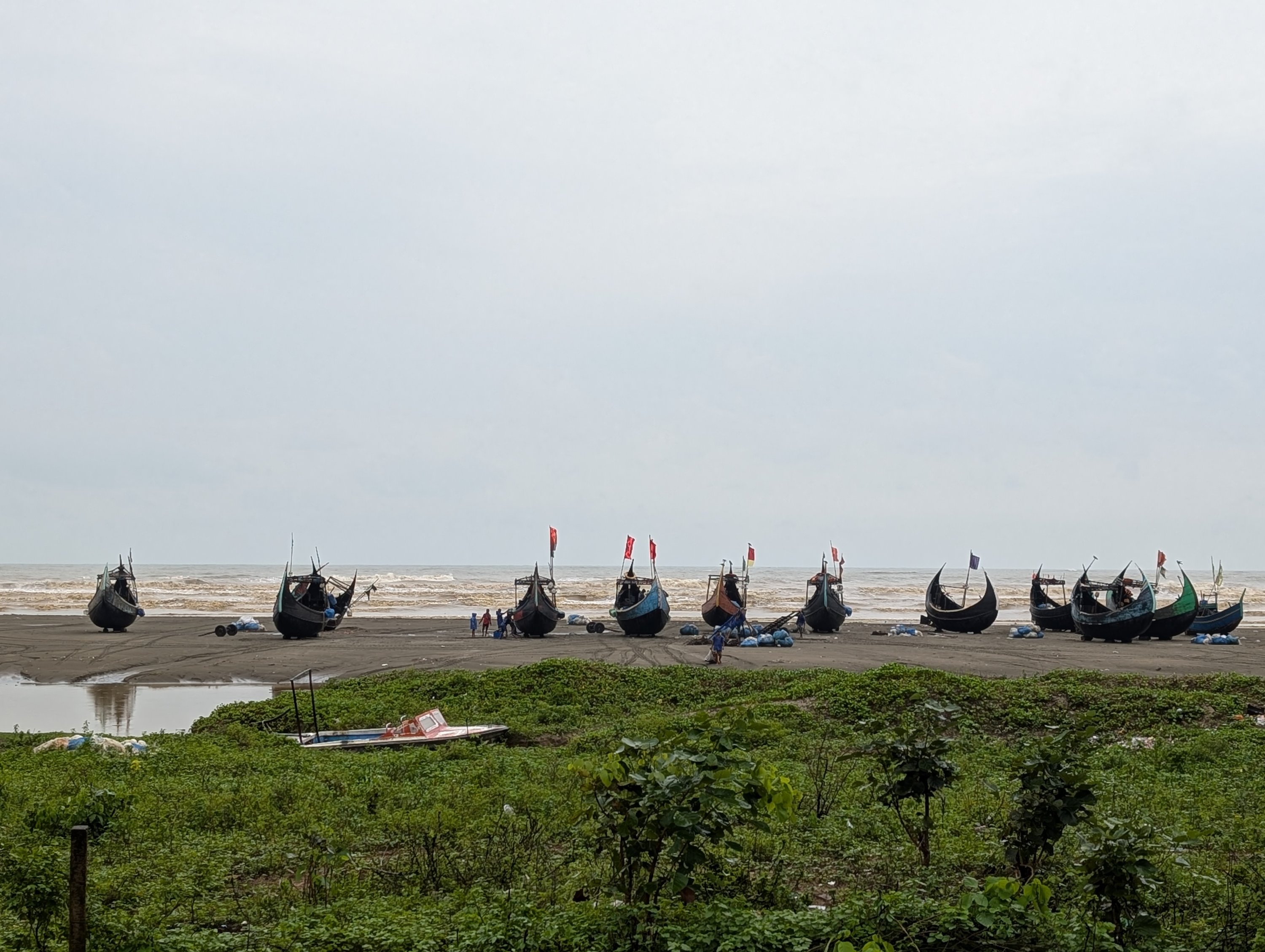 Sampan boats on a beach south of Cox's Bazar, Bangladesh, June 18, 2025. (Photo by Shakir Husain)