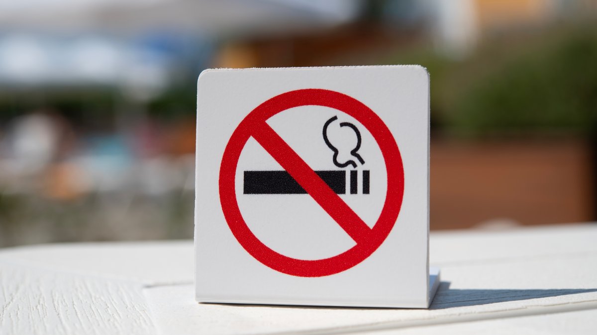 A non-smoking sign is displayed prominently at a public venue. (Shutterstock Photo)