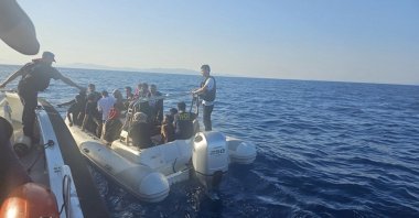 Coast guard forces rescue 33 irregular migrants off the coast of Izmir province, Türkiye, July 22, 2025 (AA Photo)