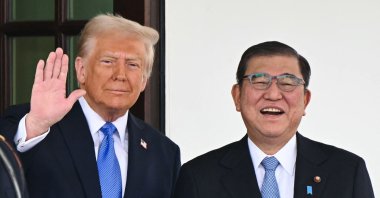 U.S. President Donald Trump waves as he greets Japanese Prime Minister Shigeru Ishiba upon arrival outside the West Wing of the White House in Washington, D.C., U.S., Feb.7, 2025. (AFP Photo)