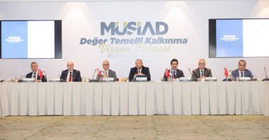 Burhan Özdemir (C), the head of the Independent Industrialists and Businessmen Association (MÜSIAD), speaks during a meeting to announce the &quot;Value-Based Development Vision Document,&quot; Istanbul, Türkiye, July 23, 2025. (AA Photo)