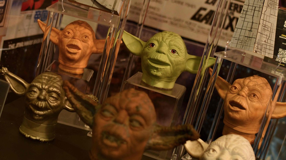 Kenner Yoda hand puppet prototype heads from "The Empire Strikes Back" are displayed during the final preview of Turner Classic Movies (TCM) and Julien’s Auctions "Echoes from the Galaxy: A Star Wars Memorabilia Exhibit + Auction" at the Comic-Con Museum in San Diego, California, U.S., July 23, 2025. (AFP Photo)