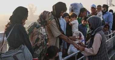 Afghan refugees arrive from Iran at the Pul-e Abrisham border crossing between Afghanistan and Iran, Zaranj, Afghanistan, July 13, 2025. (AFP Photo)