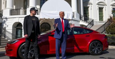 U.S. President Donald Trump talks to the media next to Tesla CEO Elon Musk, at the White House in Washington, D.C., U.S., March 11, 2025. (Reuters Photo)