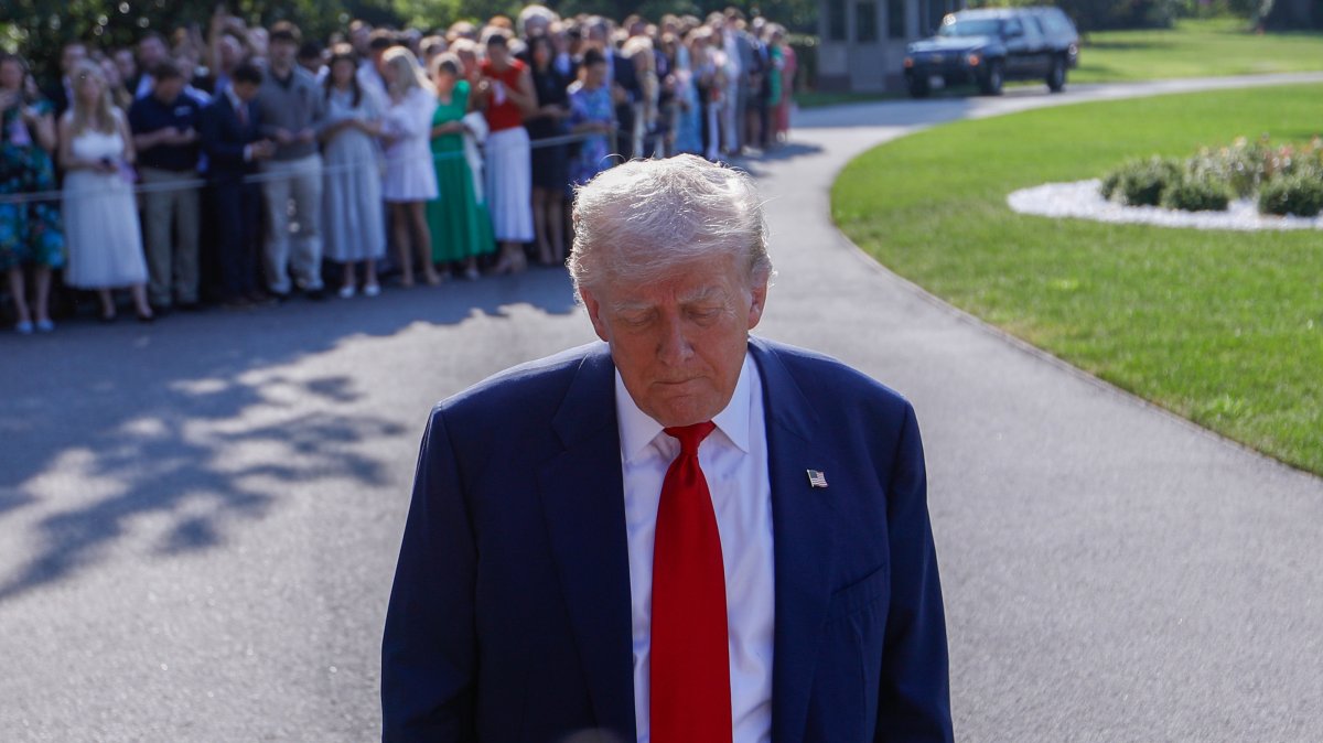 U.S. President Donald Trump talks to reporters before he departs for Scotland, at Joint Base Andrews, Maryland, U.S., July 25, 2025. (AA Photo)