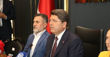 Justice Minister Yılmaz Tunç is seen with Justice and Development Party (AK Party) officials in Adana, Türkiye, July 24, 2025 (AA Photo)