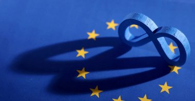 The EU flag and Meta logo are seen in this illustration taken on May 22, 2023. (Reuters Photo)