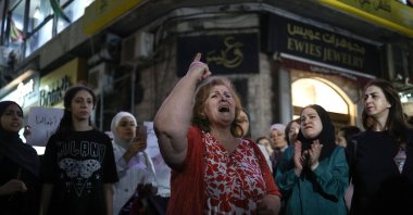 A Palestinian woman chants slogans during a demonstration in support of Palestinians in Gaza facing severe shortages of food and other essentials in the city of Ramallah, Israeli-occupied West Bank, Palestine, July 23, 2025. (AFP Photo)
