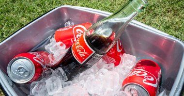 Coke beverages are displayed in an ice-cooler at a park, in Austin, Texas, U.S., July 17, 2025. (AFP Photo)