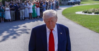 U.S. President Donald Trump talks to reporters before he departs for Scotland, at Joint Base Andrews, Maryland, U.S., July 25, 2025. (AA Photo)