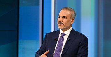 Foreign Minister Hakan Fidan speaks during an interview with private broadcaster NTV, in Istanbul, Türkiye, July 25, 2025. (AA Photo) 
