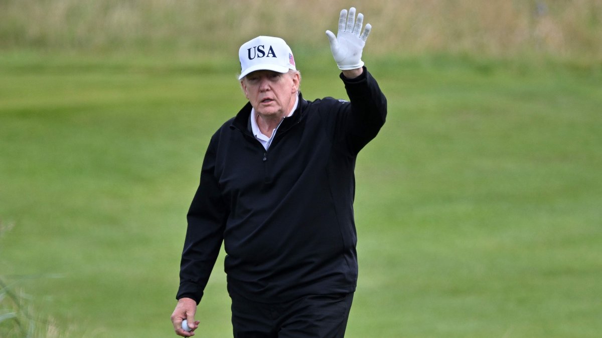 U.S. President Donald Trump reacts as he plays golf at the Trump Turnberry Golf Courses, in Turnberry on the south west coast of Scotland, July 26, 2025. (AFP Photo)