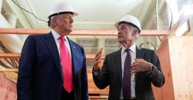 U.S. President Donald Trump (L) and Federal Reserve (Fed) Chair Jerome Powell speak during a tour of the renovations of the Fed building, Washington, U.S., July 24, 2025. (Reuters Photo)