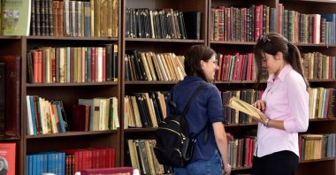 International students gather to study and connect in the library of a Turkish university. (Shutterstock Photo)