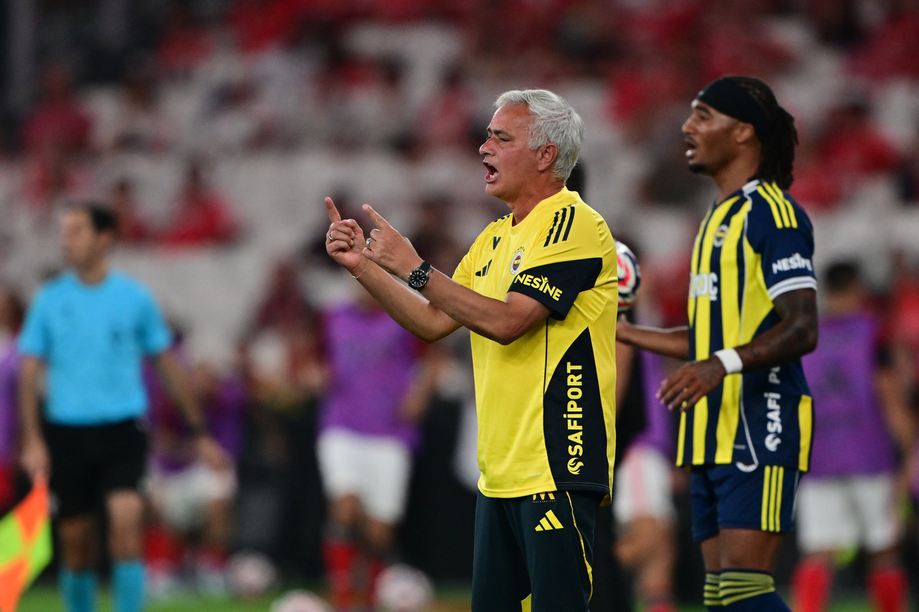 Fenerbahçe's coach Jose Mourinho () gives instructions during a friendly match against Benfica at the Estadio do Sport Lisboa, Lisbon, Portugal, July 26, 2025. (AA Photo)