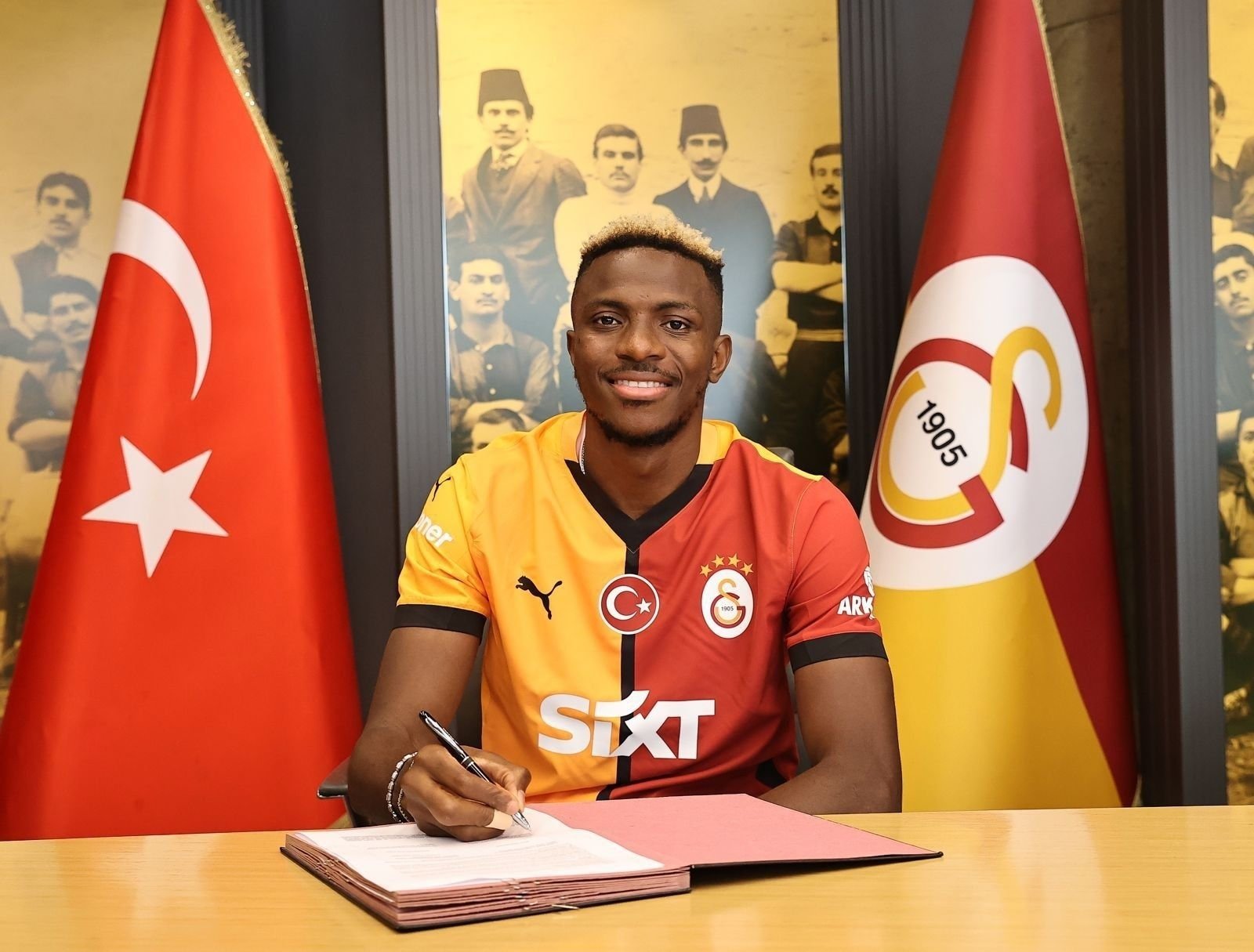 Galatasaray&#039;s new signing, Victor Osimhen, poses for a photo as he signs his contract, Istanbul, Türkiye, Sept. 5, 2024. (IHA Photo)