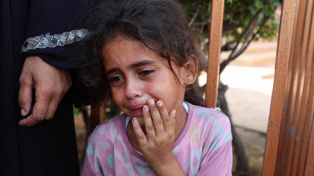 A child reacts during the funeral of Palestinians killed in an overnight Israeli strike, in Khan Younis, southern Gaza Strip, Palestine, July 28, 2025. (Reuters Photo)