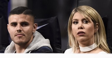 Mauro Icardi (L) and his wife and football agent Wanda Nara attend the Serie A football match between Inter Milan and Lazio at the Stadio Giuseppe Meazza, Milan, Italy, March 31, 2019. (Getty Images Photo)