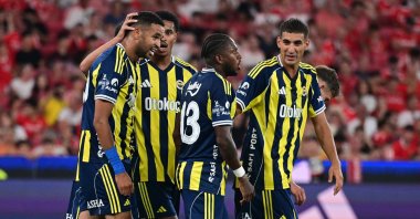 Fenerbahçe&#039;s Youssef En-Nesyri (L) celebrates with his teammates after scoring during a friendly match against Benfica at the Estadio do Sport Lisboa, Lisbon, Portugal, July 26, 2025. (AA Photo)