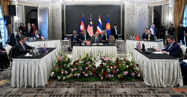 Malaysia&#039;s Prime Minister Anwar Ibrahim looks on as Cambodia&#039;s Prime Minister Hun Manet and Thailand&#039;s acting Prime Minister Phumtham Wechayachai take part in mediation talks on the Thailand-Cambodia border conflict, in Putrajaya, Malaysia, July 28, 2025. (Reuters Photo)