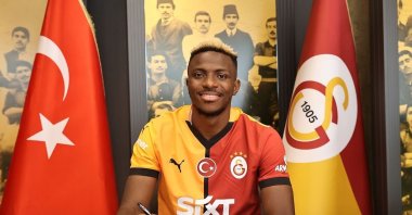 Galatasaray&#039;s new signing, Victor Osimhen, poses for a photo as he signs his contract, Istanbul, Türkiye, Sept. 5, 2024. (IHA Photo)