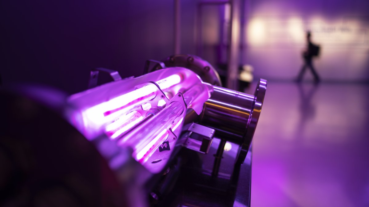 A display shows the ultraviolet light technology used to treat wastewater as a group tours the NEWater visitor center in Singapore, Tuesday, July 18, 2023. (AP File Photo)